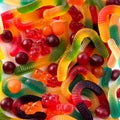 Pattern of colorful gummy bears and worms against white background top view. Royalty Free Stock Photo