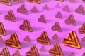 Pattern of cookies in the shape of a heart, arrows. Seamless background with cookies. Cookies isolated on a lilac-pink background