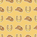 Pattern cowboy hat for horseman and horseshoe on yellow background. Stetson hat for cowboy and horse shoe seamless Royalty Free Stock Photo