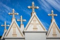 Pattern of crosses tombstones in Cemetery in a row and clear sky Royalty Free Stock Photo