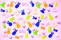 Pattern of decorative rabbits and colored eggs on pink background. Happy Easter concept. Bold hues for seasonal projects Royalty Free Stock Photo