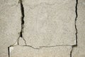 Pattern decorative uneven cracked real stone wall surface with cement. Close-up Royalty Free Stock Photo