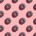 the pattern of a donut covered in chocolate with white stripes on a pink background Royalty Free Stock Photo
