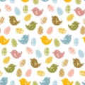 A pattern of Easter eggs with a texture of different types of fabric and colors. The contours of eggs and birds are made