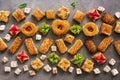 Pattern of eastern sweet baklava on a brown rustic background. Arabic dessert. Overhead view