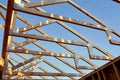 The pattern of the eaves and trusses on a stick built home