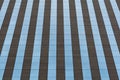 Pattern of a facade of a tall building with glass and concrete Royalty Free Stock Photo