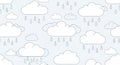 Pattern features simplistic cloud illustrations with raindrops on a light blue Royalty Free Stock Photo