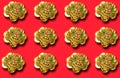 Pattern with a figure of a money toad or money frog on a red background. Symbol of wealth, Feng Shui Royalty Free Stock Photo