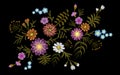 Pattern of flovers on a black background. Imitation embroidery. Royalty Free Stock Photo