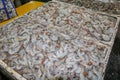 Pattern of fresh shrimps selling on a seafood counter in Jimbaran. Pasar Ikan Kedonganan - Bali beach. Fresh shrimp on the local