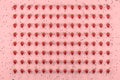 Pattern of fresh strawberries on pink background