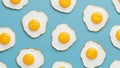Pattern of fried eggs on blue background Royalty Free Stock Photo