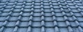 Pattern of frozen rooftop tiling in macro closeup, cold winter season, architecture background