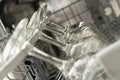 Pattern glasses of wine are stacked rhythmically in the dishwasher. Royalty Free Stock Photo
