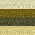 Pattern of gold, brown, white and gray stripes with embossed relief Royalty Free Stock Photo
