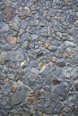 pattern gray color of modern style design decorative uneven cracked real stone wall surface with cement Royalty Free Stock Photo