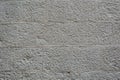 gray color of modern style design decorative uneven cracked real stone wall surface with cement Royalty Free Stock Photo