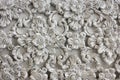 Pattern of gray flower carved on stucco design