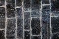 Pattern grey color of old stone wall uneven cracked real stone wall surface with cement Royalty Free Stock Photo