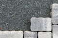 Pattern of grey paving stones at a chip foundation Royalty Free Stock Photo