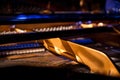 Pattern of hammers and strings inside piano, close up. One hummer in action while key is pressed. Stand out from the crowd