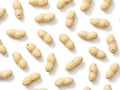 Pattern of individual peanuts on white background Royalty Free Stock Photo
