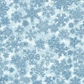 A pattern of intricately designed snowflakes on a light blue background. Each Royalty Free Stock Photo