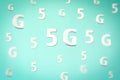 Pattern with large white flying letters 5 G on blue background. Creative concept. Modern wireless high speed mobile internet.