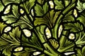 Pattern of leafs in stained glass Royalty Free Stock Photo