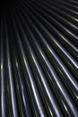 Pattern of lots of shiny stainless industrial metal steel pipe tubes to cut weld process and work with Royalty Free Stock Photo