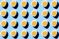 Pattern made of eggs on pastel blue background. Minimal food concept