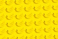 Pattern of many bananas on yellow background. Royalty Free Stock Photo