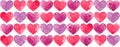 A pattern of many small watercolor hearts in red and pink, arranged in neat rows. Seamless pattern.