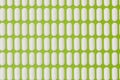 Pattern, many white pills on a green background
