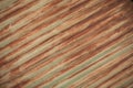 Pattern metal surface with pastel colour. scratched metal surfac. Red toned background Royalty Free Stock Photo