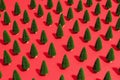 Pattern of miniature-pine trees on a red-background. Royalty Free Stock Photo
