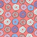 Pattern multicolored sweet delicious donuts with chocolate and jam on a pink background