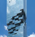 Pattern of office buildings windows. Glass architecture facade design with reflection in urban city, Downtown Bangkok. Urban city Royalty Free Stock Photo