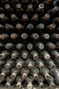 Pattern of old expensive wine bottles in winery Royalty Free Stock Photo