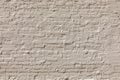 pattern of old historic brick wall painted in ochre mixed with grey Royalty Free Stock Photo