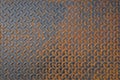 Pattern of old metal diamond plate, Surface of black steel floor non-skid with rusted, Texture background. Royalty Free Stock Photo