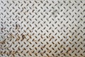 Pattern of old metal diamond plate, Surface of steel floor non-skid, White painted with rusted and dirty stain Royalty Free Stock Photo