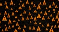 a pattern of orange triangles on a black background Royalty Free Stock Photo