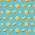 Pattern of oranges slices isolated on blue background.