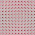 Pattern of pair of red and pink heart shaped royal icing cookies on gray background Royalty Free Stock Photo