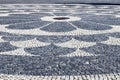 Pattern in paving stone with iron centre on Hviezdoslav Square near Slovak National Theatre, Bratislava, Slovakia Royalty Free Stock Photo