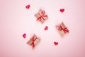 Pattern on a pink background. Gift boxes and hearts. Blank for greeting card. Valentine`s Day, Mother`s Day, March 8 Day