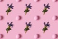 Pattern of pink Easter eggs and spring flovers over pink background Royalty Free Stock Photo