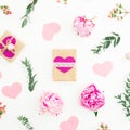 Pattern of pink peonies, roses and eucalyptus branches and gifts on white background. Love composition. Flat lay Royalty Free Stock Photo